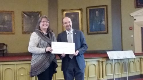 BCK Board member accepting a cheque from Mayor of Kingston for the 2018 City of Kingston Heritage Grant.